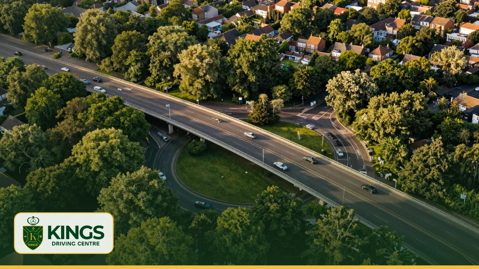 Aerial view of a roundabout beneath a dual carriageway flyover